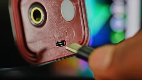Person charging a device through type-c cable 4k short Stock-Footage 289400506
