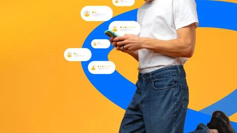 Person checking mobile phone while receiving feedback in a vibrant setting Stock Photos