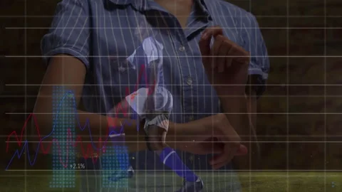 Person checking smartwatch with financial graph animation overlaying soccer 動画素材 305488592