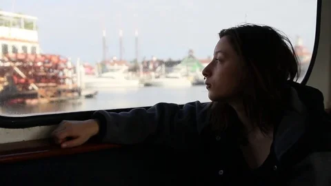 Person chilling on a boat looking through windows Stock Footage 83035430