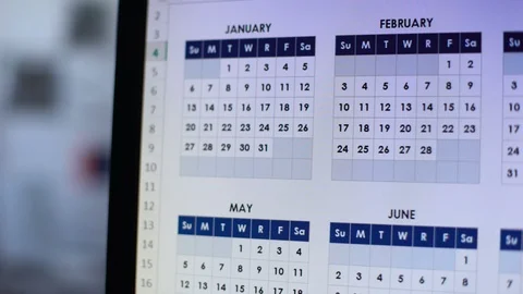 Person choosing date, looking through calendar on computer, wedding planning Vídeo Stock 104040435