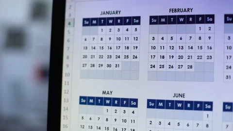 Person choosing date, looking through calendar on computer, wedding planning Vídeo Stock 104070156