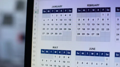 Person choosing date, looking through calendar on computer, wedding planning Vídeo Stock 104070918
