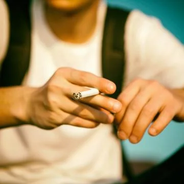 Person with a Cigarette Foto stock