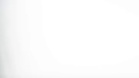 Person cleaning camera sensor using specialist static charged cleaning brush Stock Footage 80946931