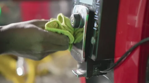 Person Cleaning Coffee Machine Display with Green Cloth Video stock 317183744