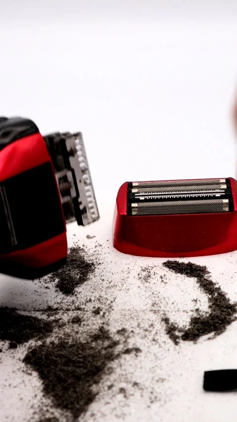 A person cleaning a razor Stock Footage 336321468