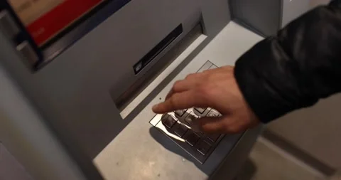 Person closeup of entering pin code at ATM Stock Footage 229724545