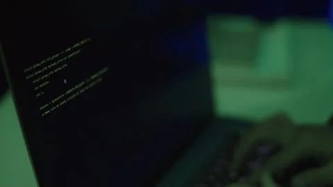 Person Coding on Laptop while Hacking or Working at Late Time 스톡 동영상 256981727