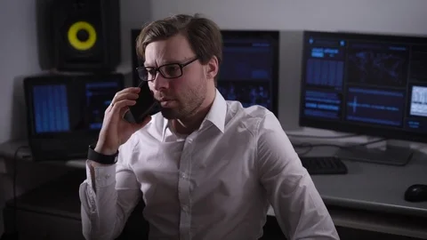 The person in the computer room. The young guy with points and in a white shirt 스톡 동영상 72447897