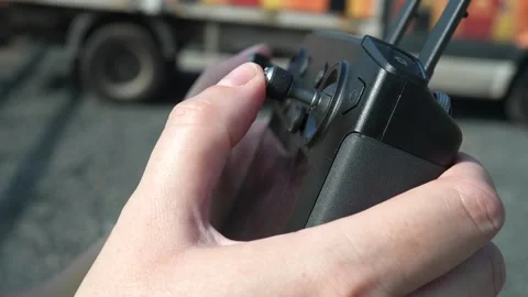 Person controlling drone Stock Footage 165374871