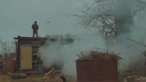 A person controls a drone, launching a drone Stock Footage 322223422