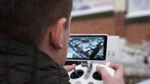 Person controls quadcopter. Stock Footage 106893368