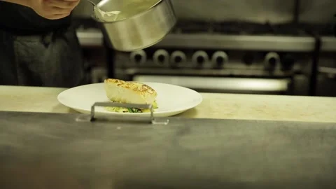 A person cooking food on a table Stock Footage 155455697