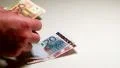 Person counting money HD Footage