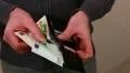 Person counting money HD Footage
