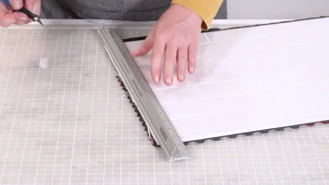 Person cutting mosaic tile sheets for backsplash Stock Footage 312467756