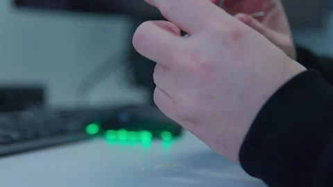 A person cutting nails on a workplace Stock Footage 272456662
