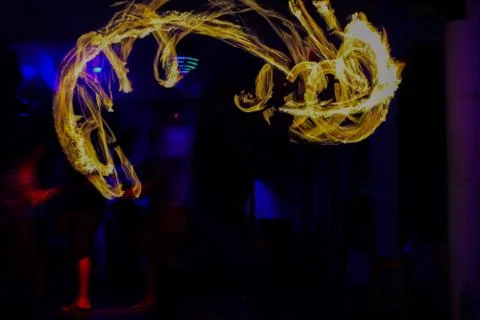 Person dancing with fire Stock Photos