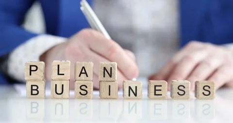 Person develops business plan for successful business closeup Video stock 279938036