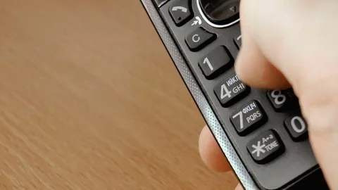 Person dials a number on the handset Stock Footage 78910510