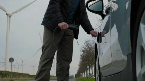 Person disconnects charging cable Stock Footage 341042542