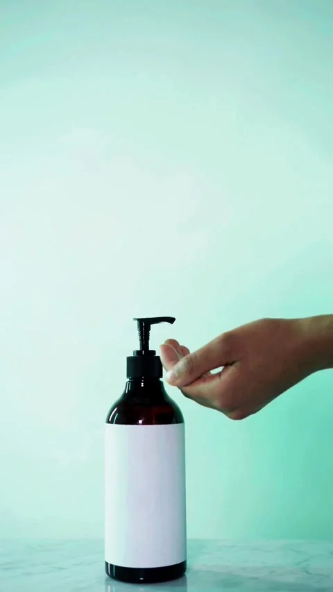 Person Dispensing Liquid Soap from Pump Bottle in Hand Video stock 342781032