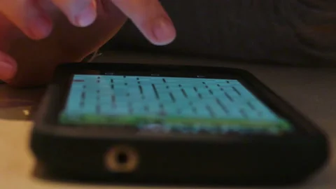 Person doing a brainteaser puzzle on an app on a smartphone Video stock 152363166