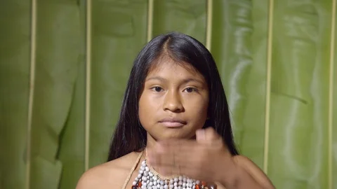 Person doing a gesture with her hand like i do not want to see in ecuador Stock Footage 113182404
