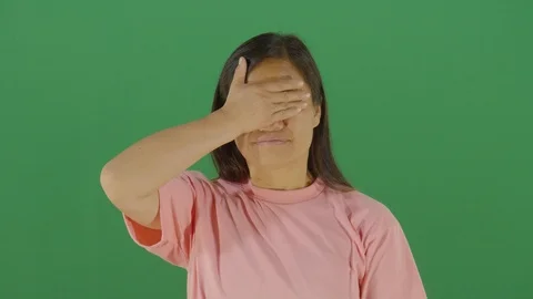 Person doing a gesture with her hand like i do not want to see studio isolated Stock Footage 126309189
