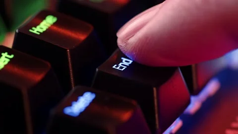 Person is in doubt whether to press the End key or not. The finger hovers o.. Stock Footage 234792747