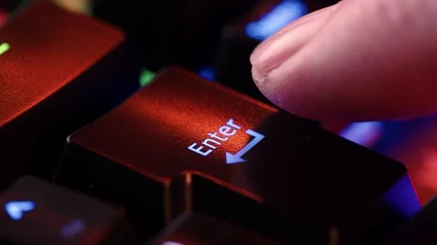 Person is in doubt whether to press the enter key or not. The finger hovers.. Stock Footage 234792865