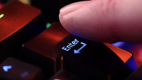 Person is in doubt whether to press the enter key or not. The finger hovers.. Stock Footage 254623803