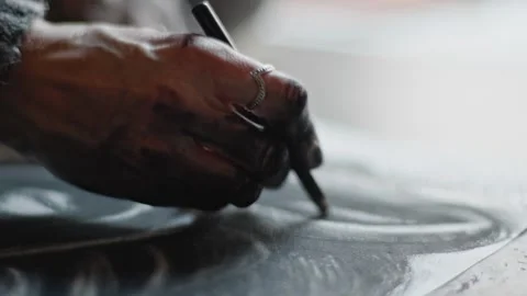 Person drawing on paper with pen creating art, macro shot Stock Footage 268606450