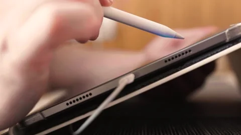 Person drawing on a tablet. Technology concept. Video stock 300761205