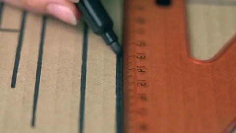 The person draws a line parallel to the other lines Stock Footage 143708023