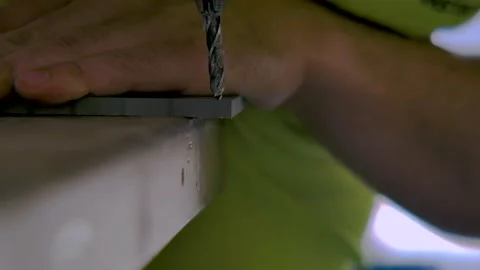 Person Drilling Through Plastic Stock Footage 201964844