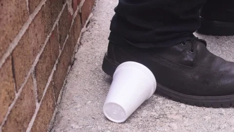 Person Drops Empty White Cup Near foot and Walks Away Stock-Footage 347586851