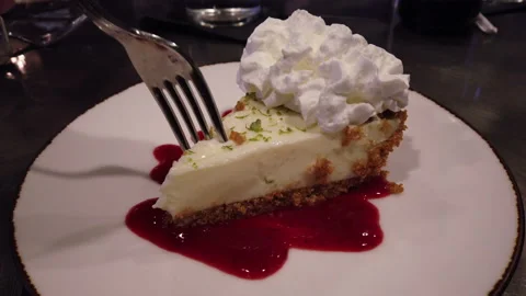 Person eating a slice of savory fridge or cheese cake Stock Footage 157344191