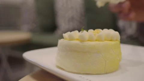 Person Eating a Small Lemon Cake with a Fork 스톡 동영상 343908464