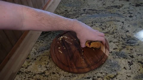 Person Eats Bite of Scone Stock-Footage 235830539