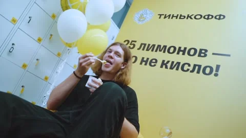 A person eats ice cream with a spoon from a cup Stock Footage 202383251