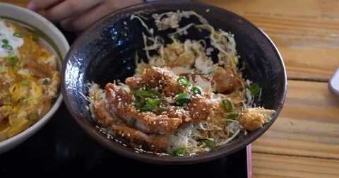 Person eats katsu don Stock Footage 83407425