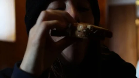 Person eats sandwich Stock Footage 82998494