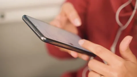 Person edits and schedules content. Close examination of fingers creating Stock Footage 337722496