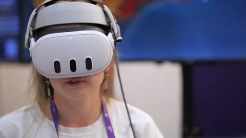 Person engaged in virtual reality gaming using motion controllers Stock Footage 346148163
