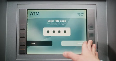 Person Entering PIN Code on ATM Keypad. Error Message on Cash Machine Display Stock Footage 310129027