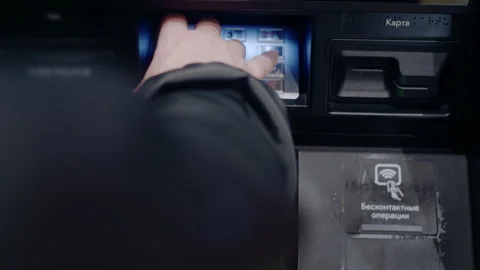 Person entering pin code on atm keypad Vídeo Stock 336710772