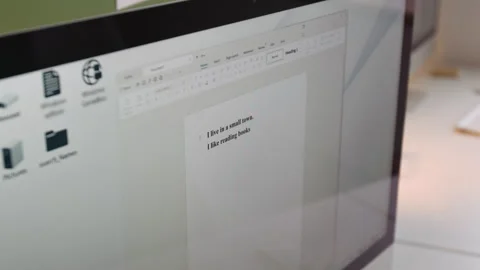 Person Entering Text into Document in Computer Class Stock Footage 333703879