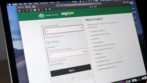 Person entering a two step authentication password with MyGov website in Stock Footage 96201480